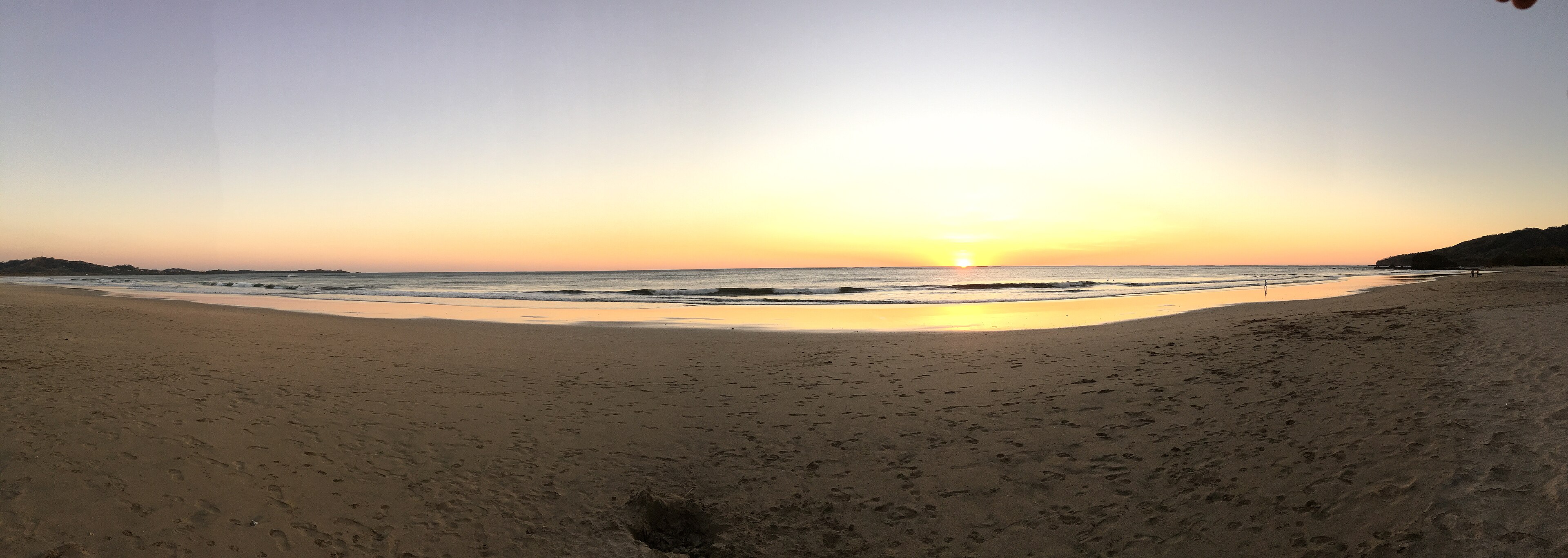 Sunset over the empty sand of Playa Grande in Las Baulas park